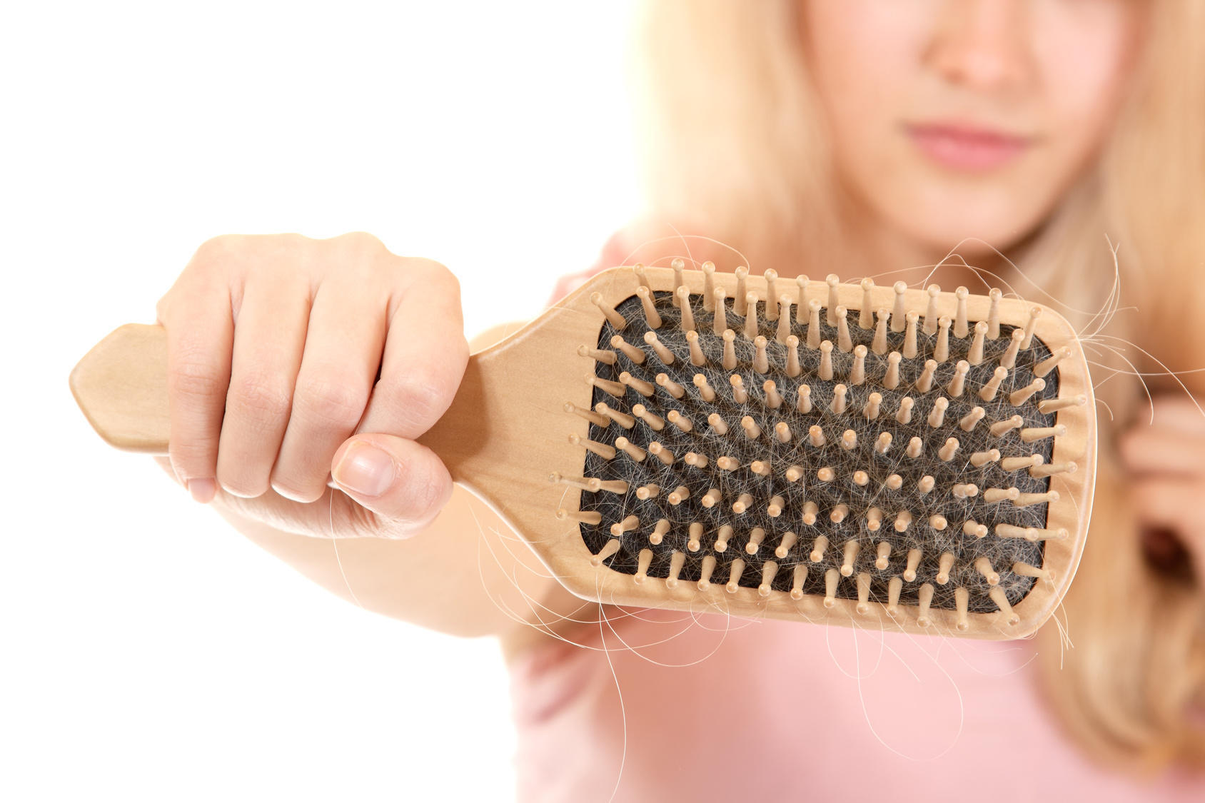 women with hair broblem holding loss hair comb in hand, isloated on white background